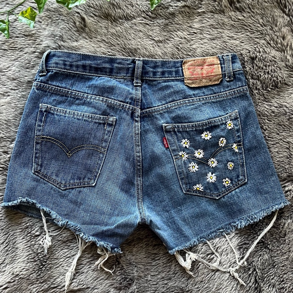 Hand embroidered Levi’s jean shorts